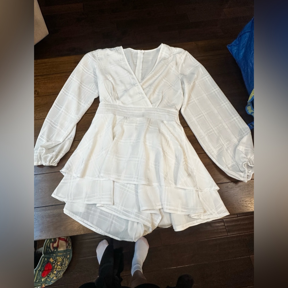 White long sleeve dressy romper. Looks like a dress.